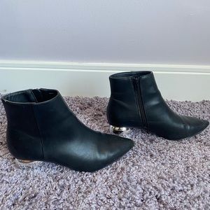 Low black faux leather pointed ankle booties